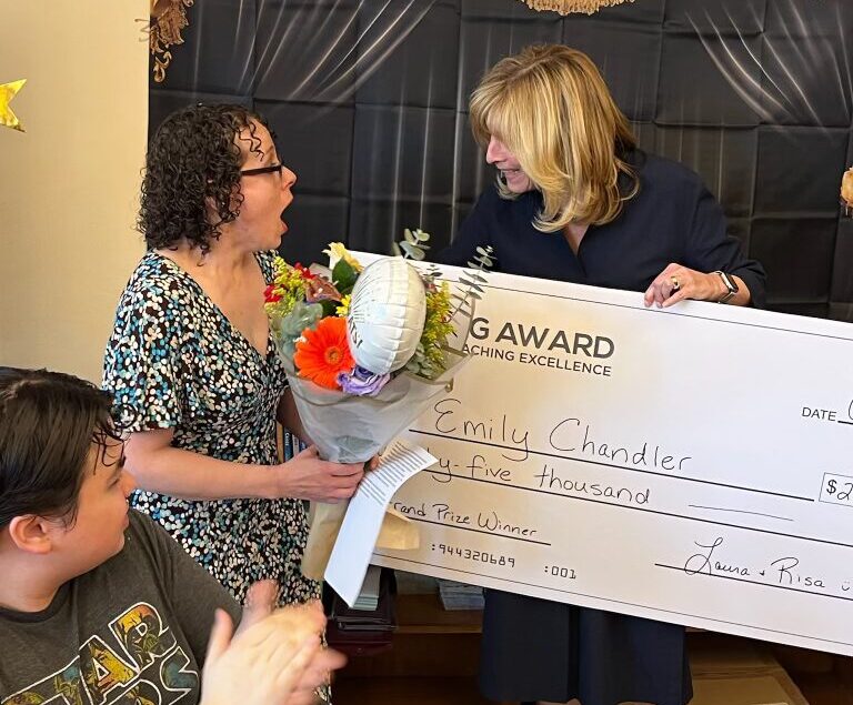 Teacher Emily Chandler surprised to win $25,000 and The FLAG Award for Teaching Excellence while teaching at P.S. 371 in Sunset Park. Photo courtesy of The FLAG Award for Teaching