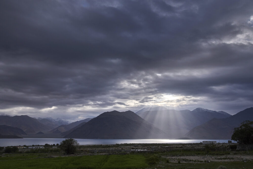 The sun rises over Pangong lake in Maan village, Ladakh, India, Tuesday, July 8, 2025.