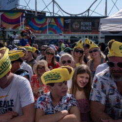 People wait for the 2025 Nathan's Famous Fourth of July hot dog eating contest in Coney Island, Thursday, July 4, 2025. AP Photo/Yuki Iwamura