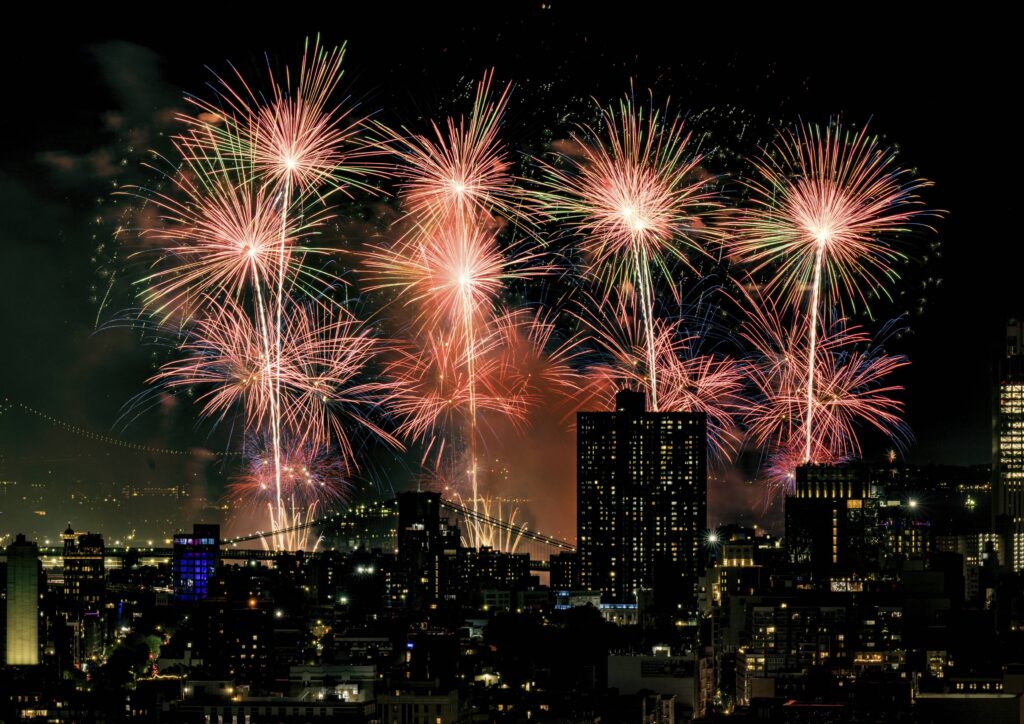 Fireworks explode over the East River and Brooklyn Bridge during the Macy's 4th of July Fireworks Show on July 4, 2025 in New York. Photo: Evan Agostini/Invision/AP