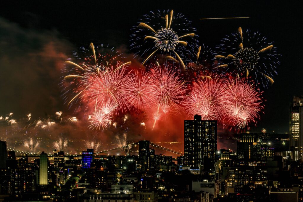 Fireworks explode over the East River and Brooklyn Bridge during the Macy's 4th of July Fireworks Show on July 4, 2025 in New York. Photo: Evan Agostini/Invision/AP