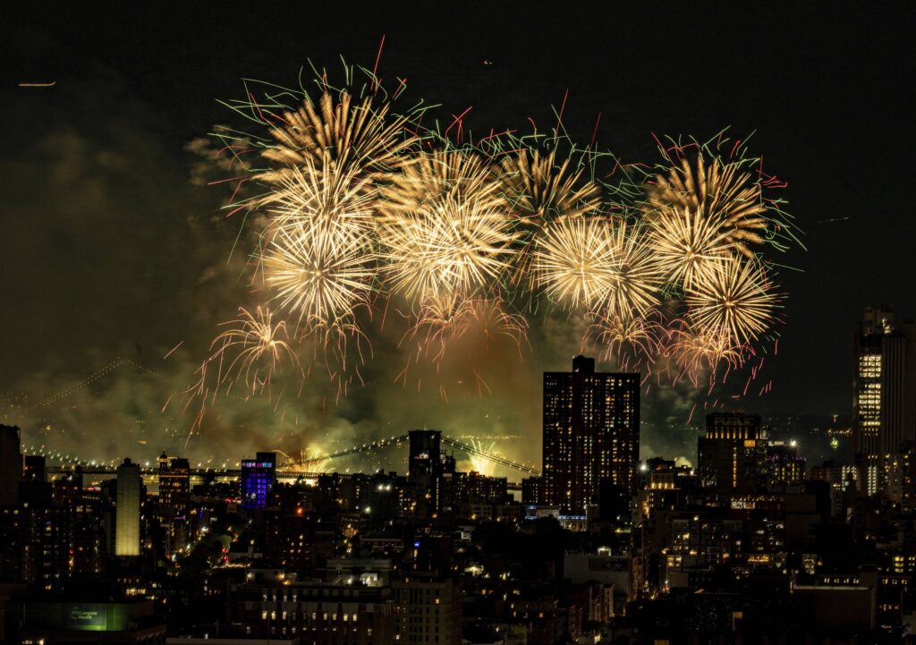 Fireworks explode over the East River and Brooklyn Bridge during the Macy's 4th of July Fireworks Show on July 4, 2025 in New York. Photo: Evan Agostini/Invision/AP