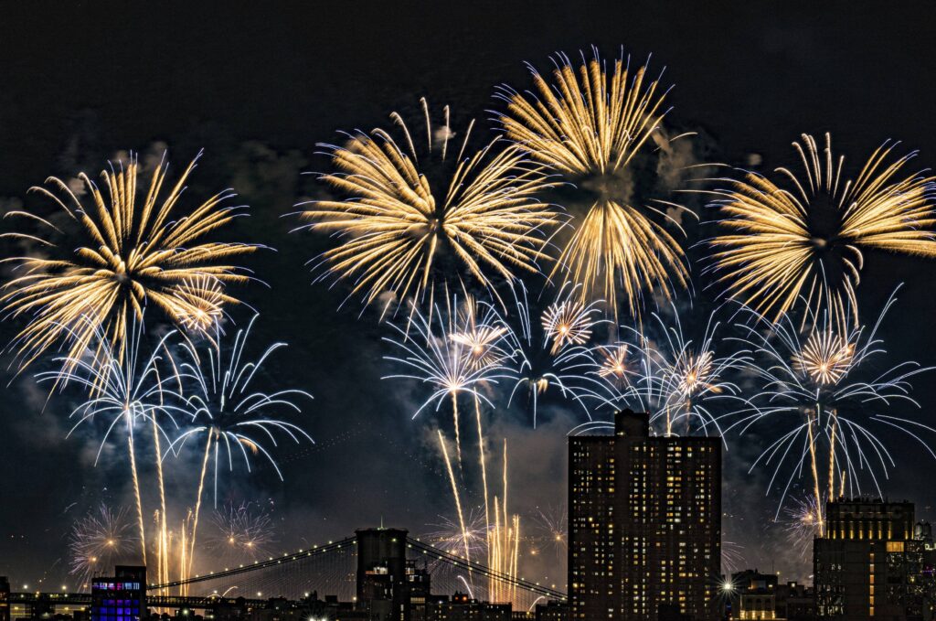 Fireworks explode over the East River and Brooklyn Bridge during the Macy's 4th of July Fireworks Show on July 4, 2025 in New York. Photo: Evan Agostini/Invision/AP