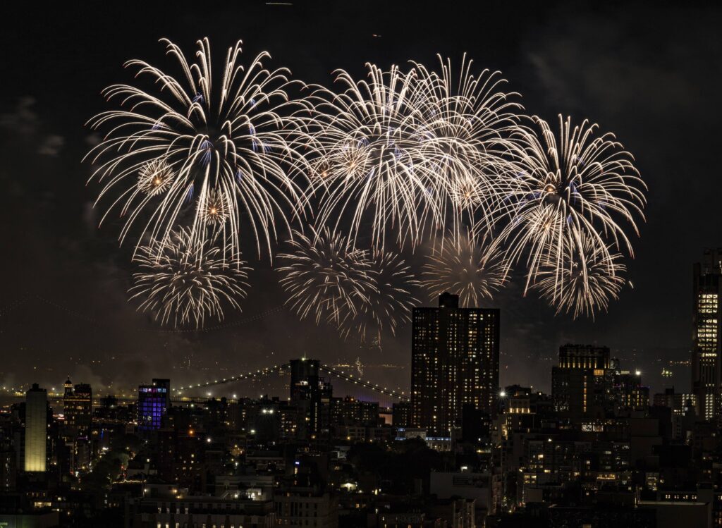 Fireworks explode over the East River and Brooklyn Bridge during the Macy's 4th of July Fireworks Show on July 4, 2025 in New York. Photo: Evan Agostini/Invision/AP