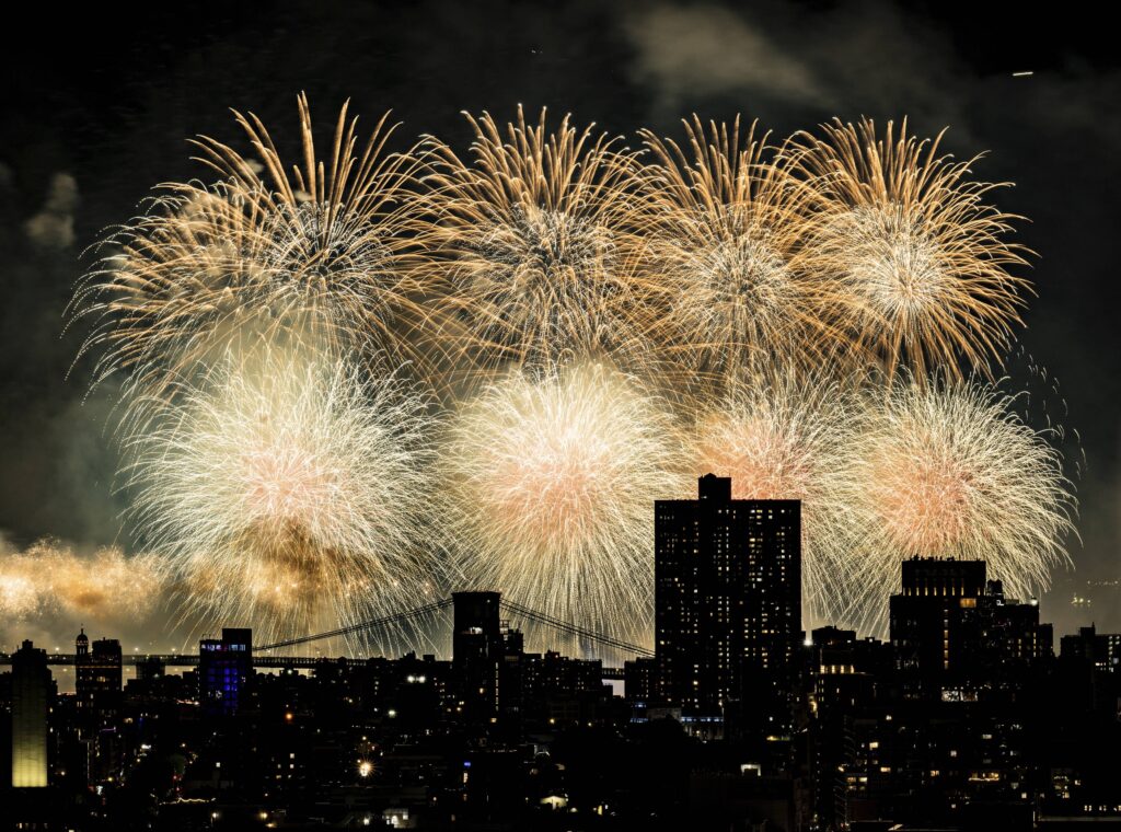 Fireworks explode over the East River and Brooklyn Bridge during the Macy's 4th of July Fireworks Show on July 4, 2025 in New York. Photo: Evan Agostini/Invision/AP