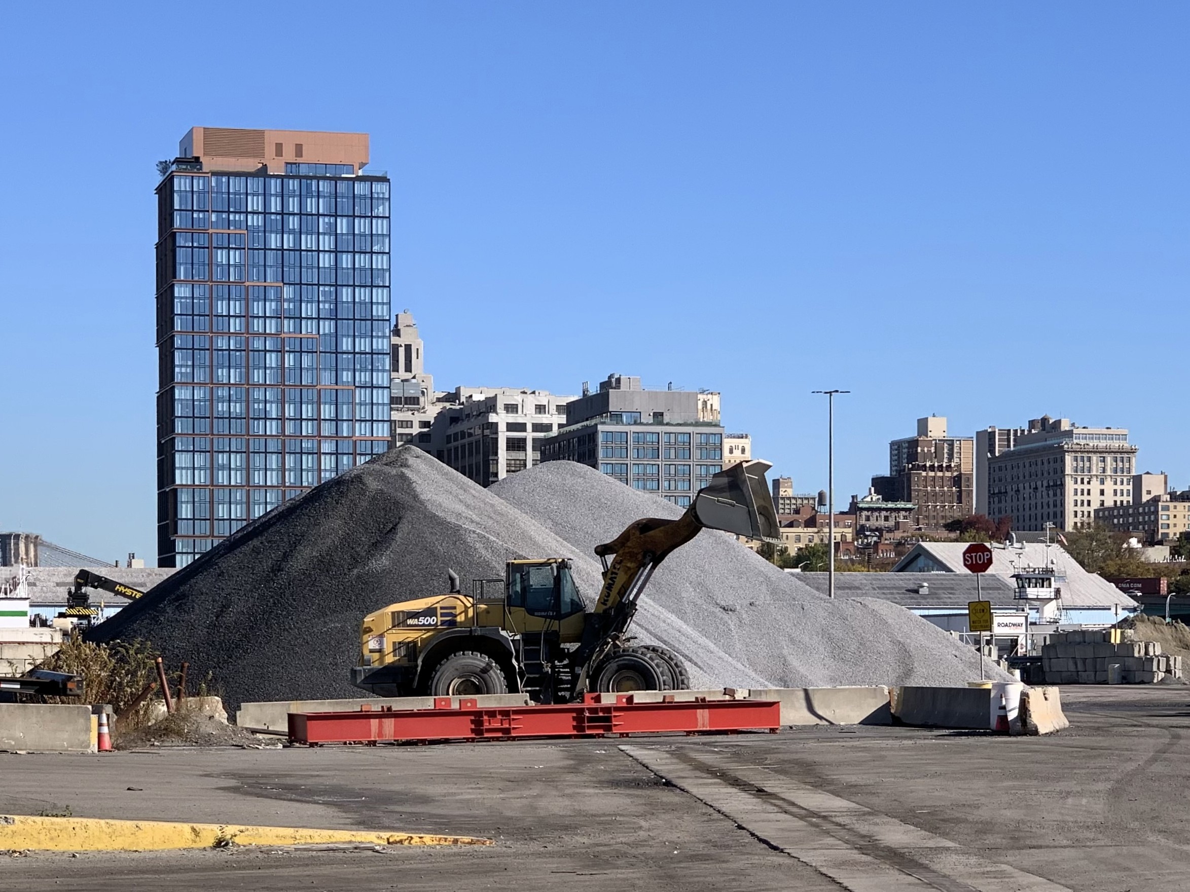 Columbia Street Waterfront District residents have complained about dust from large piles of crushed, recycled concrete at the SIMS Concrete Recycling Facility, operated by NYC DOT. Photo: Mary Frost, Brooklyn Eagle