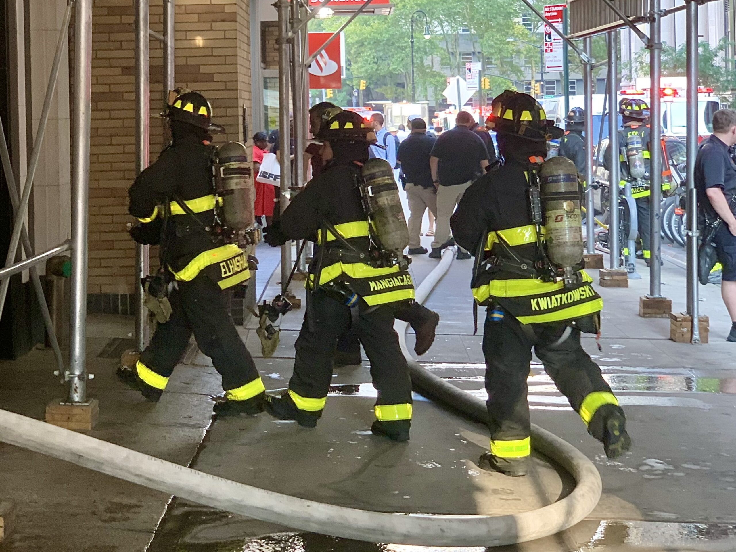Firefighters rush into an office building at 185 Montague St. in Brooklyn Heights on Monday, July 28. Photo: Mary Frost, Brooklyn Eagle