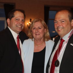 Mario Romano, right, is joined by Dr. Regina DiGiovanna, center, and longtime friend and past president Stephen Chiaino, left, during the Bay Ridge Lawyers Association’s annual dinner at The Vanderbilt at South Beach on June 25. The event marked the close of Romano’s term as president, a role he approached with gratitude and collaboration at its core. Brooklyn Eagle photo by Mario Belluomo