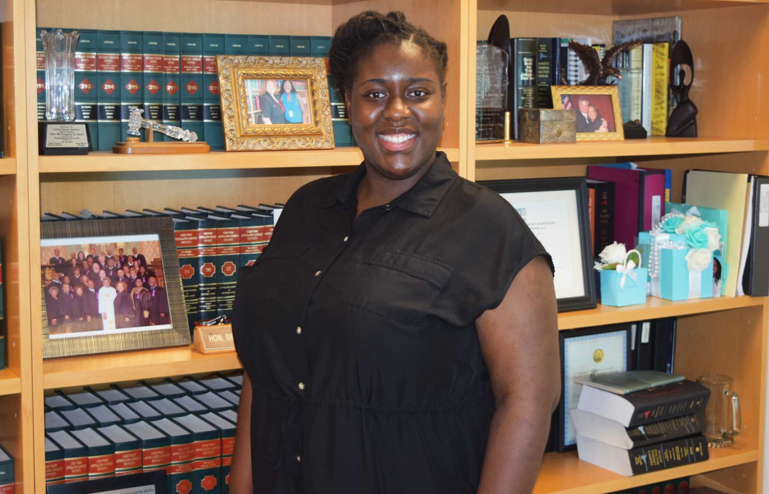 Jennifer Joly is a Brooklyn native and graduated from Clara Barton High School and Brooklyn College. She began as a court intern at age 17 and now serves as secretary to Justice Deborah Dowling in the Appellate Division, Second Department. Joly helps oversee the Kings County courts’ Summer Youth Employment Program, coordinating placements and ensuring students gain meaningful experience, just as she once did. Brooklyn Eagle photo by Robert Abruzzese