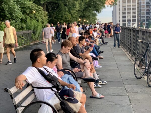 A crowd settles in to view the 4th of July fireworks from the Brooklyn Heights Promenade in 2023. Brooklyn Eagle photo by Mary Frost