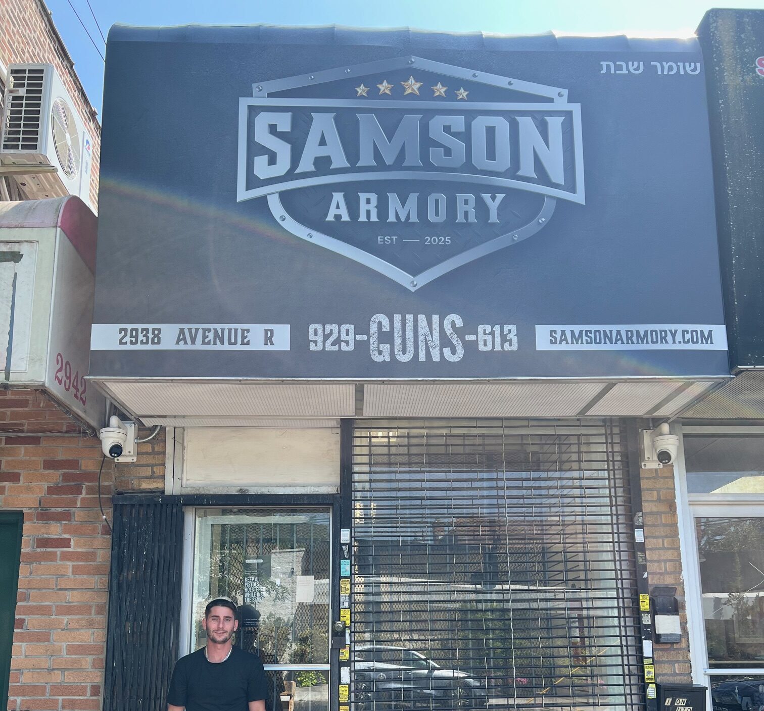 Samson Armory owner Michael Bergida in front of his business on Avenue R in Brooklyn. Brooklyn Eagle photo by Loretta Chin
