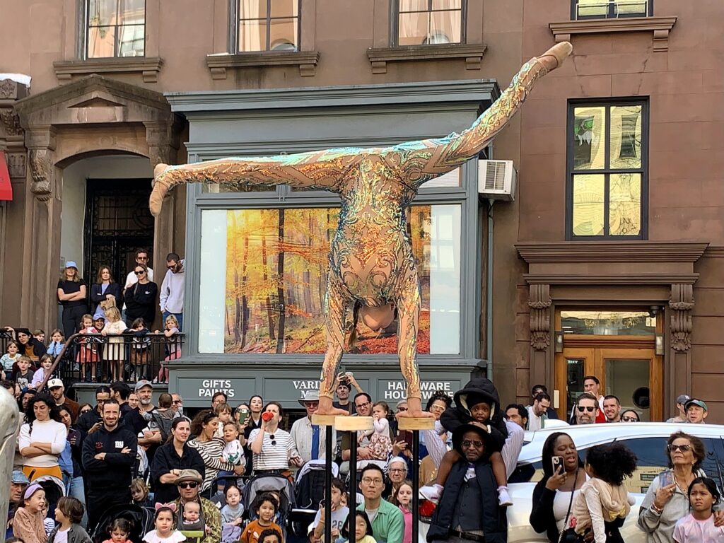 Gravity seemed to be suspended on Sunday as Bindlestiff Family Cirkus performer Dia Seskin floated over Montague Street. Photo: Mary Frost, Brooklyn Eagle