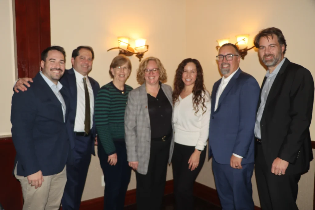 From left: Ryan Dell, FNF Family of Companies agency representative; Stephen Chiaino, Esq., counsel for Home Abstract Corp.; Karen Wysong Berg of FNF Family of Companies; Elizabeth Berg, Esq., Education and Training vice president, FNF Family of Companies; Monica Malagon, New York State Agency Sales and Operations manager, FNF Family of Companies; Mark D’Addona, Home Abstract Corp. principal; and Gregory D’Addona, Home Abstract Corp principal. Brooklyn Eagle photo by Mario Belluomo