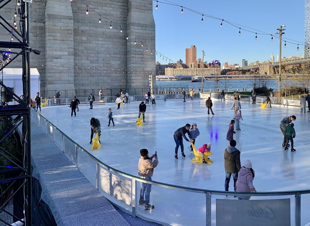Brooklyn Bridge Park’s scenic, 8,600-square-foot skating rink is returning Nov. 24. This was the scene in 2023. Photo: Mary Frost, Brooklyn Eagle