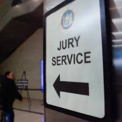 Signs direct people arriving for jury duty at Brooklyn Supreme Court, Dec. 9, 2025. Photo: Alex Krales/THE CITY