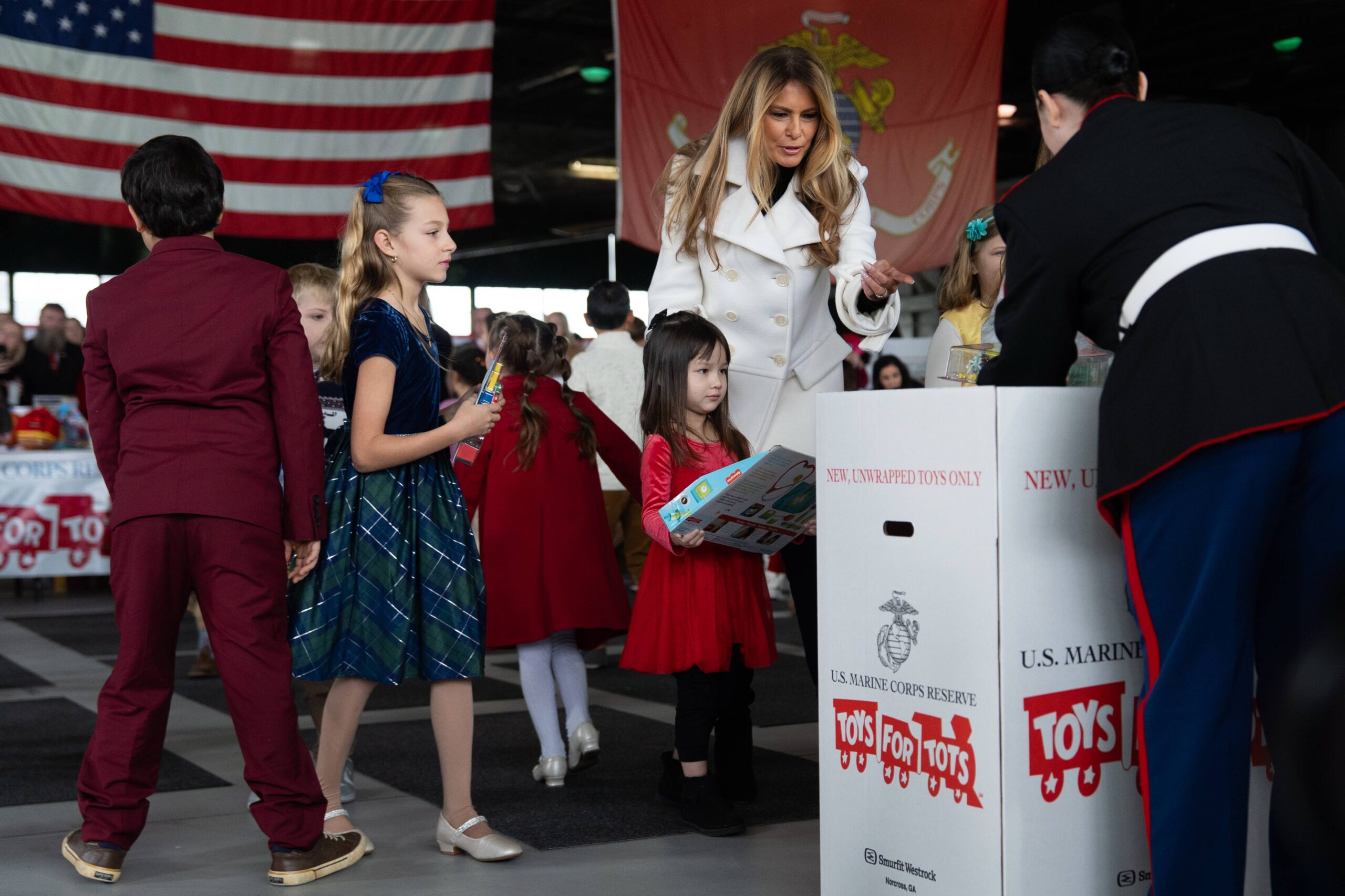 First lady Melania Trump helps kids organize toys during a Toys for Tots charity drive event at Marine Corps Base Quantico, Monday, Dec. 8, 2025, in Quantico, Va. Photo: Julia Demaree Nikhinson/AP