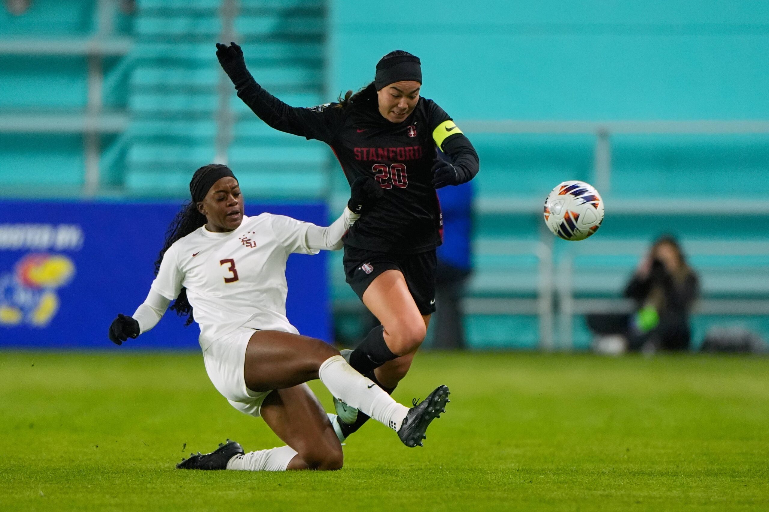 Florida State's Jaida McGrew (3) and Stanford's Andrea Kitahata (20) battle for the ball during the first half of the NCAA college soccer tournament final Monday, Dec. 8, 2025, in Kansas City, Mo. Photo: Charlie Riedel/AP