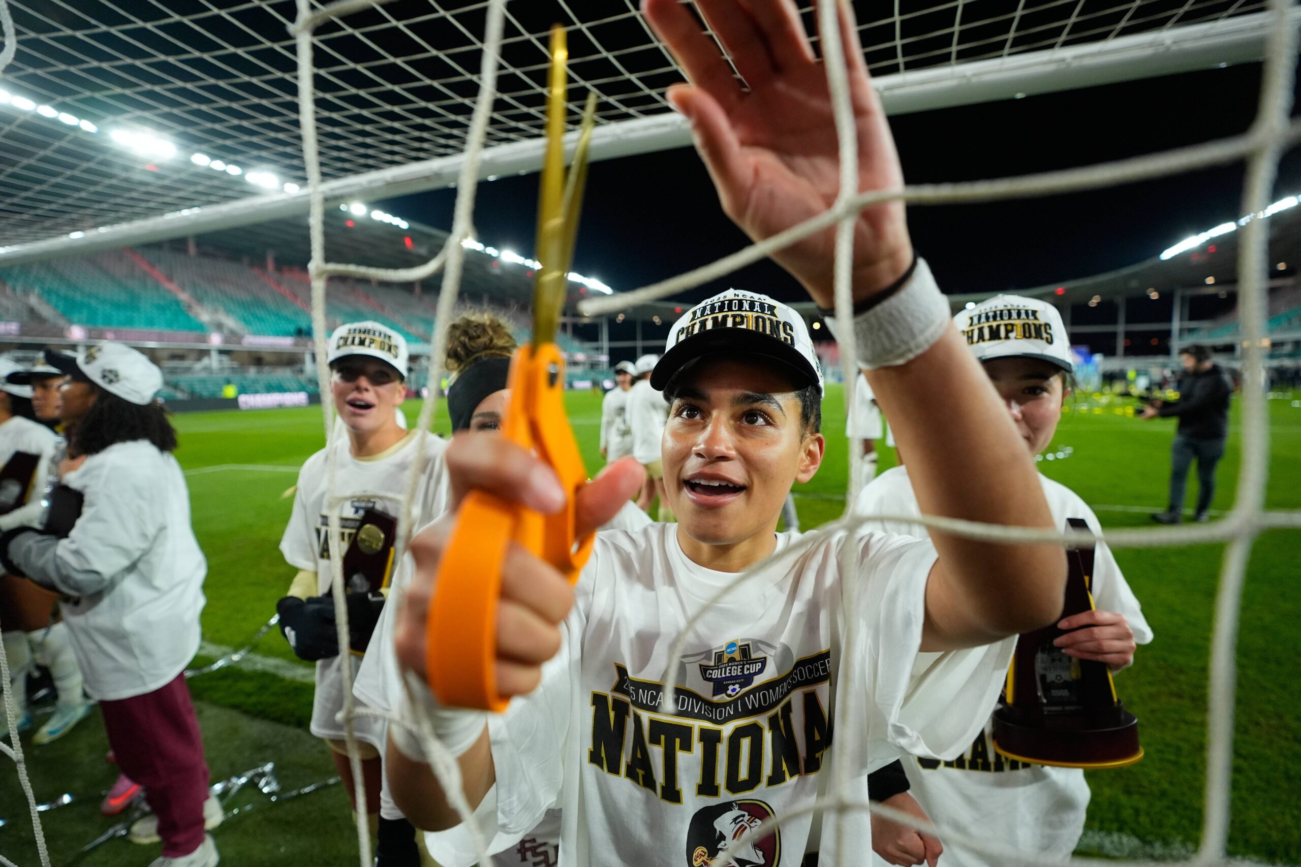 Florida State's Enasia Colon cuts the net as she celebrates her team's victory over Stanford in the NCAA college soccer tournament final Monday, Dec. 8, 2025, in Kansas City, Mo. Photo: Charlie Riedel/AP