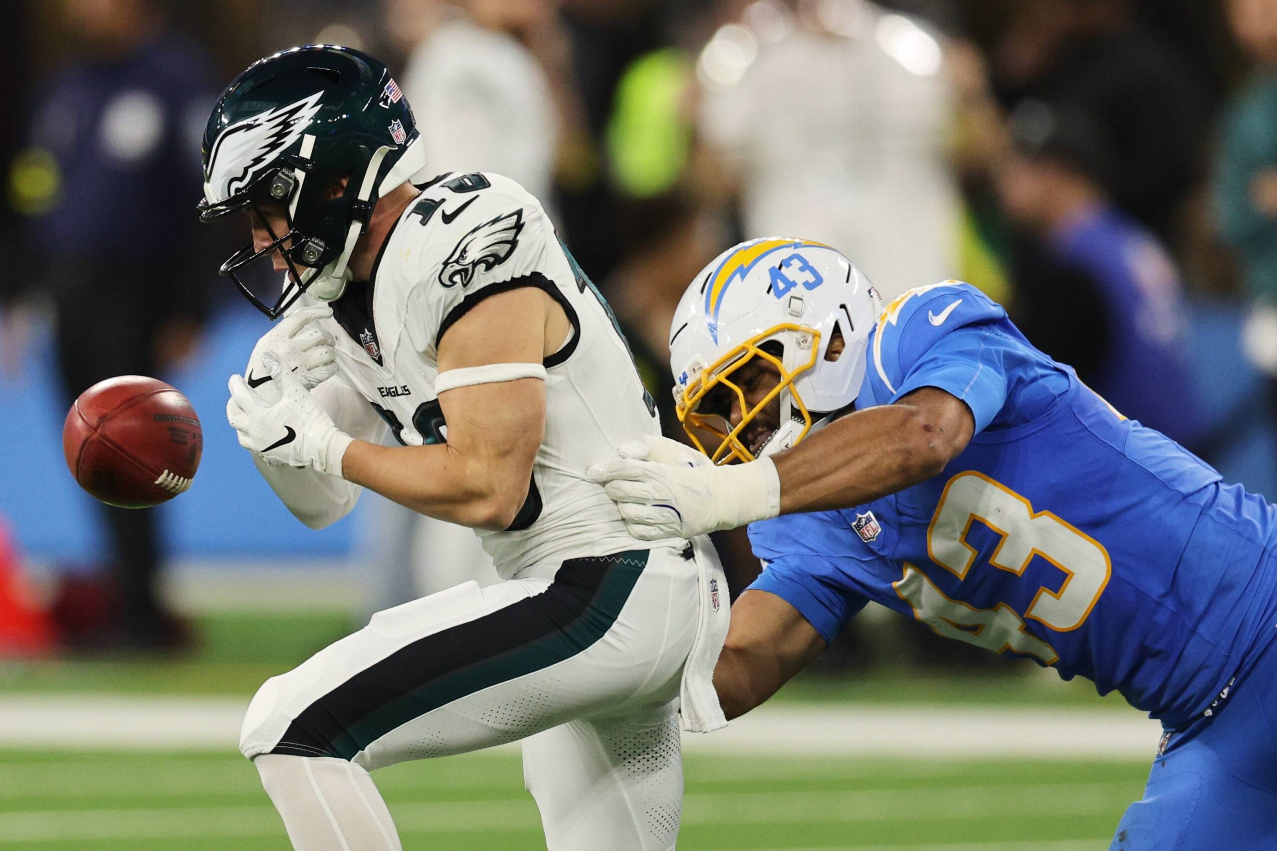 Philadelphia Eagles wide receiver Britain Covey fumbles as he is tackled by Los Angeles Chargers linebacker Troy Dye (43) during the second half of an NFL football game Monday, Dec. 8, 2025, in Inglewood, Calif. The ball was recovered by the Eagles. Photo: Kevork Djansezian/AP