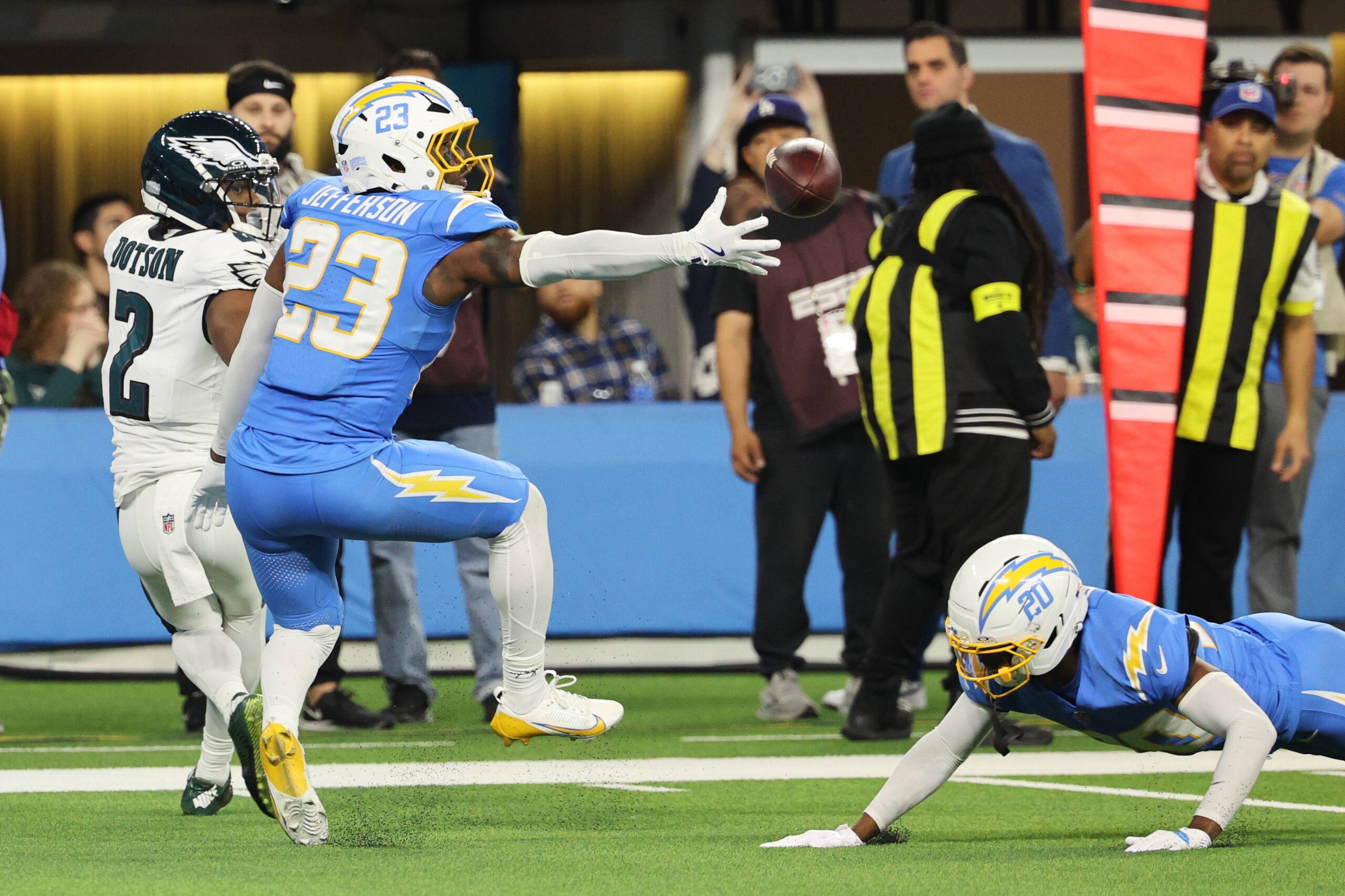Los Angeles Chargers safety Tony Jefferson (23) intercepts a pass intended for Philadelphia Eagles wide receiver Jahan Dotson (2) in overtime of an NFL football game Monday, Dec. 8, 2025, in Inglewood, Calif. Photo: Kevork Djansezian/AP