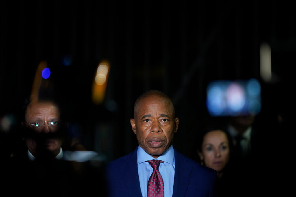 New York City Mayor Eric Adams talks to the press in front of the Basilica of Our Lady of Guadalupe, Oct. 4, 2023, in Mexico City. AP Photo/Eduardo Verdugo, File