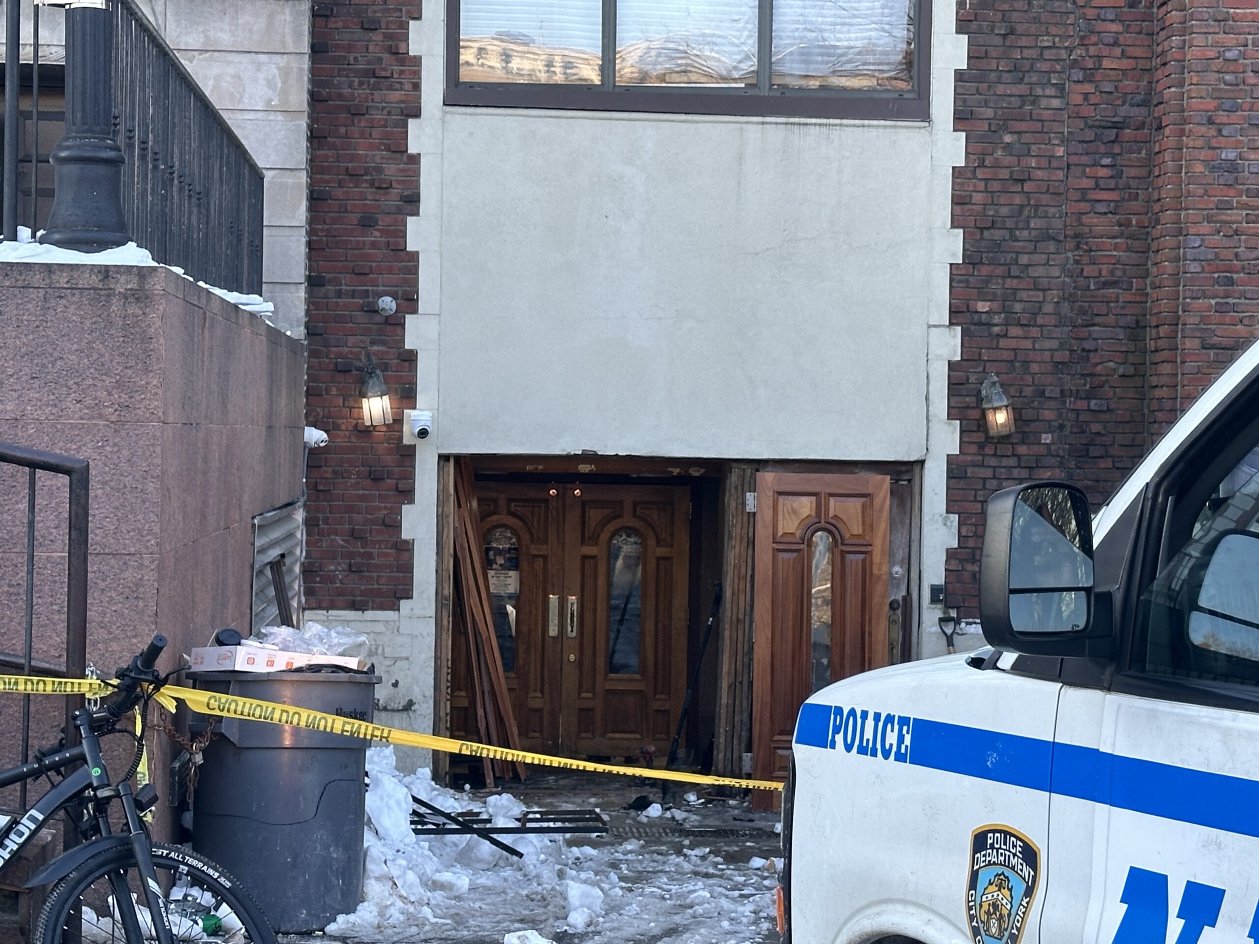 This entrance of 770 Eastern Parkway was damaged when a car slammed into it repeatedly on Wednesday night. Photo: Daniel Cody/Brooklyn Eagle
