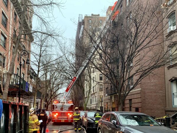 Pierrepont Street remained blocked off as firefighters smashed windows to release smoke. Photo: Mary Frost, Brooklyn Eagle
