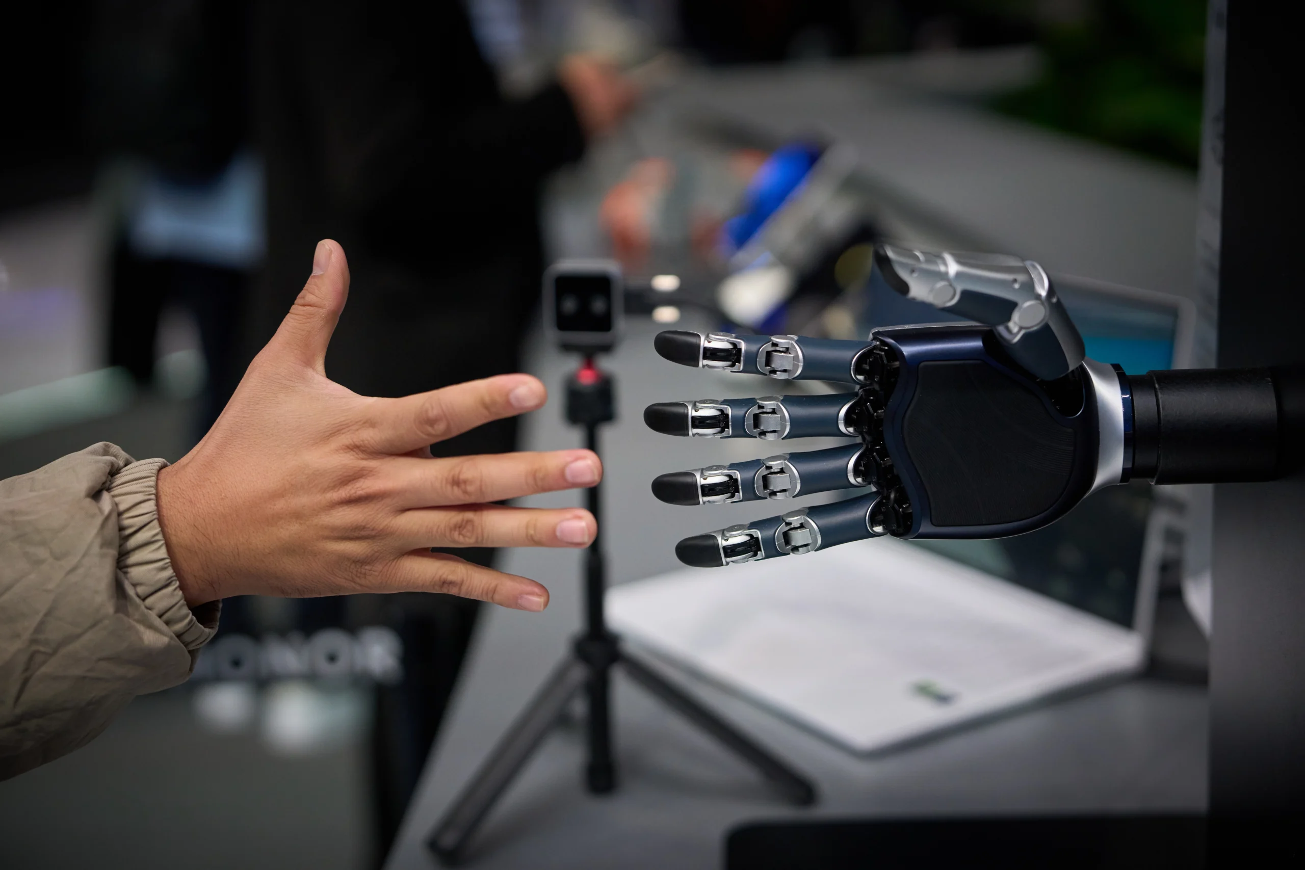 BARCELONA — If only disagreements in the Middle East could be solved this way: An assistant challenges the Dexterous bionic hand to a game of rock-paper-scissors at the Mobile World Congress wireless show, where companies from around the world showcase new products, in Barcelona, Spain, Monday, March 2, 2026. Photo: Emilio Morenatti/AP