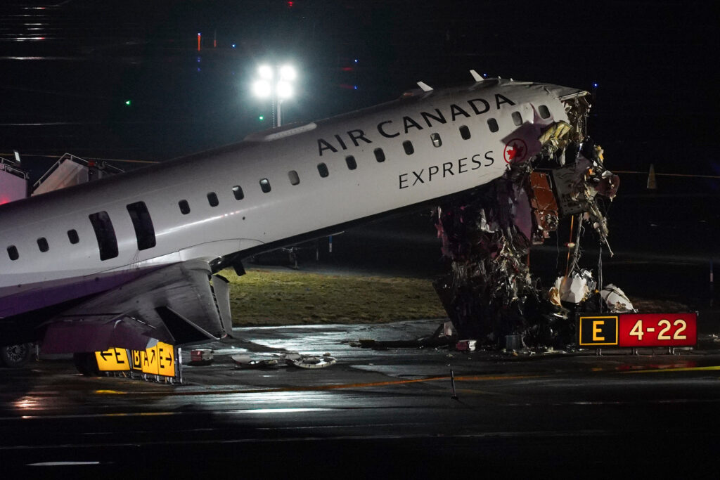 An Air Canada Jet sits on the runway at LaGuardia Airport, Monday, March 23, 2026, after colliding with a Port Authority aircraft rescue and firefighting vehicle after landing in New York. Photo: Ryan Murphy/AP