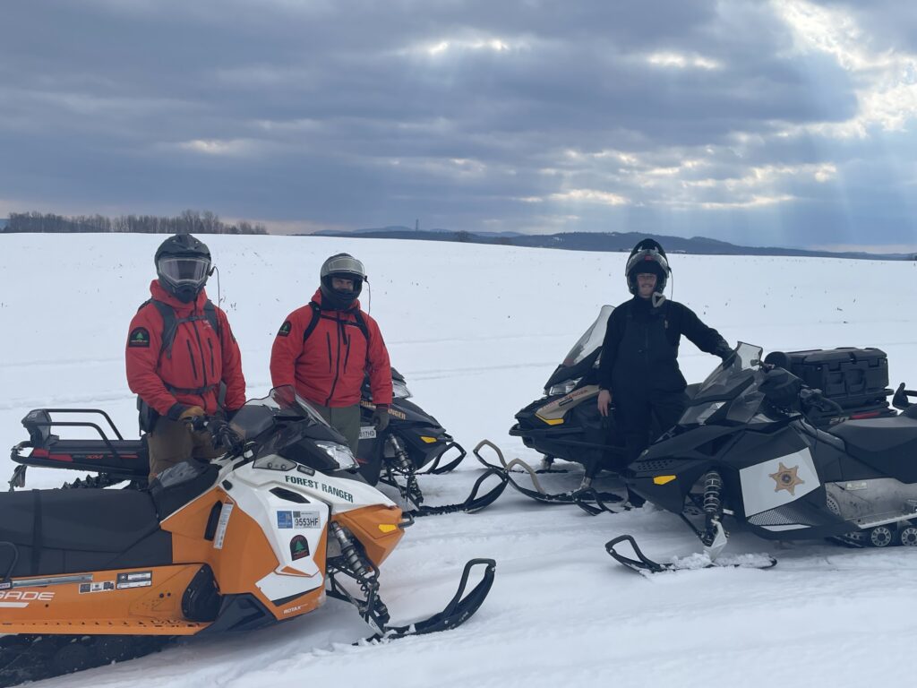 A Brooklyn man, right, was rescued by NYSDEC forest rangers in the frigid Adirondacks after his snowmobile failed on Feb. 26. Photo: New York State Department of Conservation