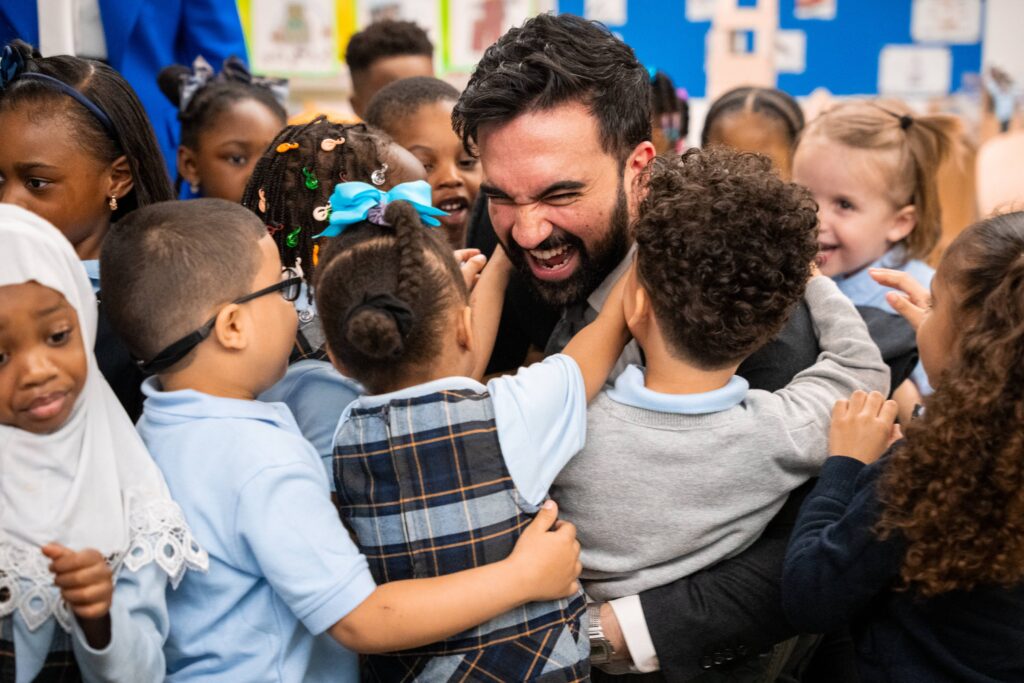 Preschoolers swarm Mayor Zohran Mamdani during a visit with Former President Barack Obama to Learning Through Play Pre-K in the Bronx in New York, Saturday, April 18, 2026. Photo: Angelina Katsanis/AP