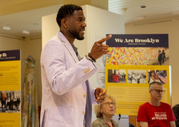 Public Advocate Jumaane D. Williams addresses Brooklyn College students, faculty and staff during the reopening of “We Are Brooklyn: Immigrant Voices,” a multimedia exhibition from the Brooklyn College Listening Project. Photo: Craig Stokle/Brooklyn College