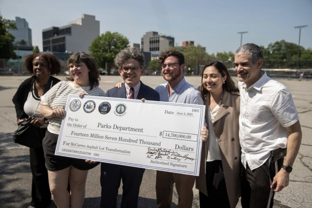Officials celebrated finalized funding for the transformation of McCarren Park’s asphalt lot in June 2025. Photo: Office of Councilmember Lincoln Restler