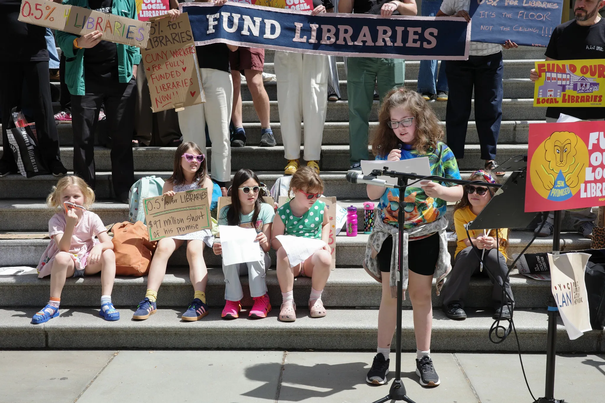 Student Isla Sobh speaks at a rally for increased library funding at City Hall, May 26, 2026. Credit: Katie Honan/THE CITY