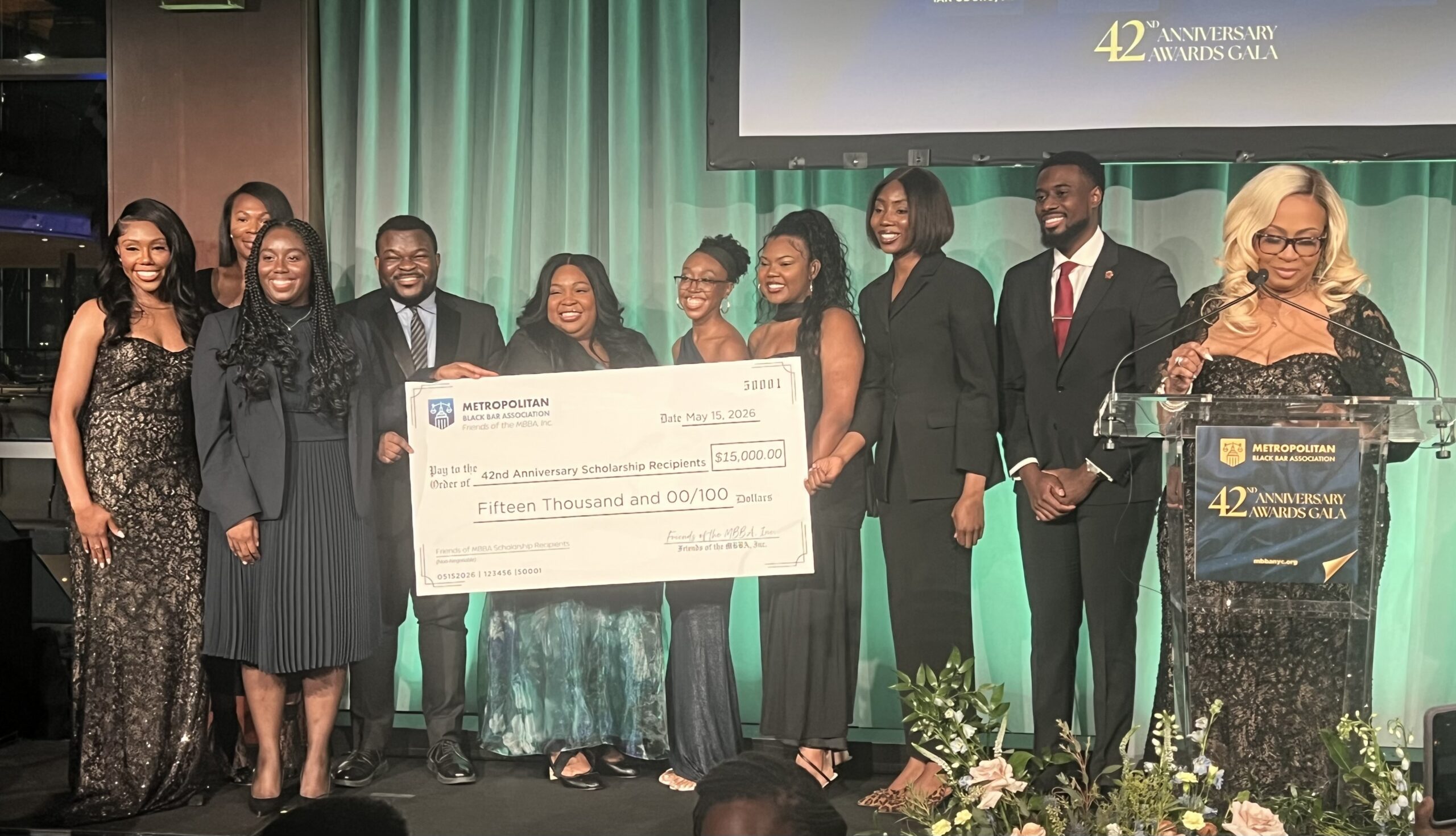 Evette C. Ennis, Esq., president of Friends of MBBA, alongside 2026 scholarship award recipients. Photo: Wayne Daren Schneiderman/Brooklyn Eagle