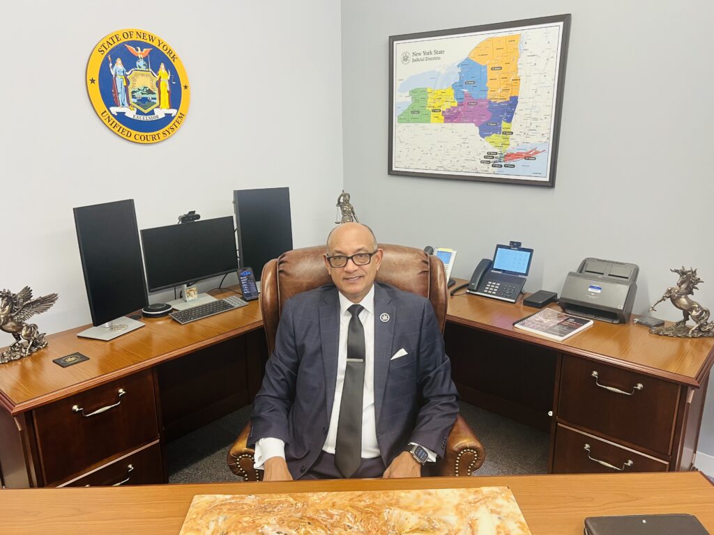 Hon. Norman St. George in his chambers. Photo: Wayne Daren Schneiderman/Brooklyn Eagle