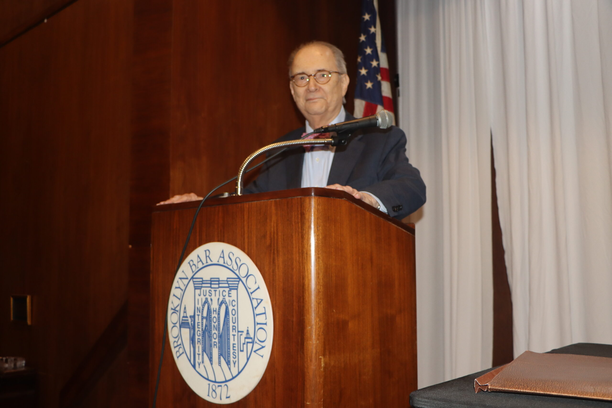 Hon. Barry Kamins at the podium. Photo: Mario Belluomo/Brooklyn Eagle