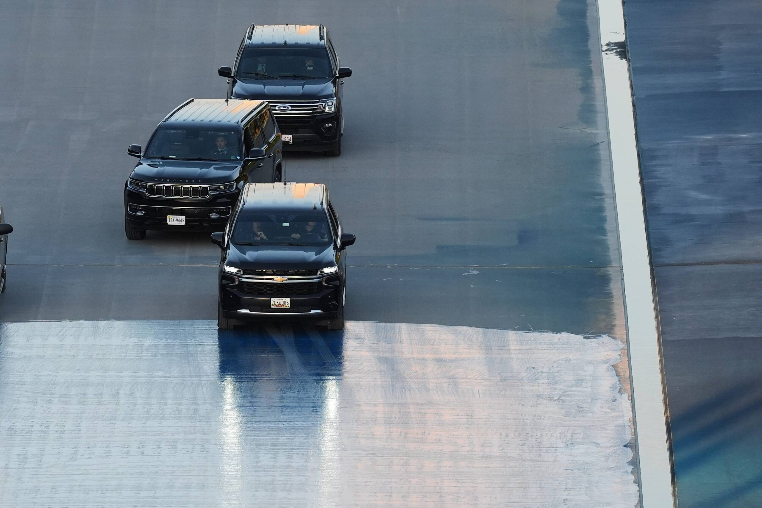 The motorcade with President Donald Trump drives in the Lincoln Memorial Reflecting Pool during a visit to see the new blue protective coating being applied as part of a renovation project, Thursday, May 7, 2026, in Washington. Photo: Alex Brandon, Pool/AP