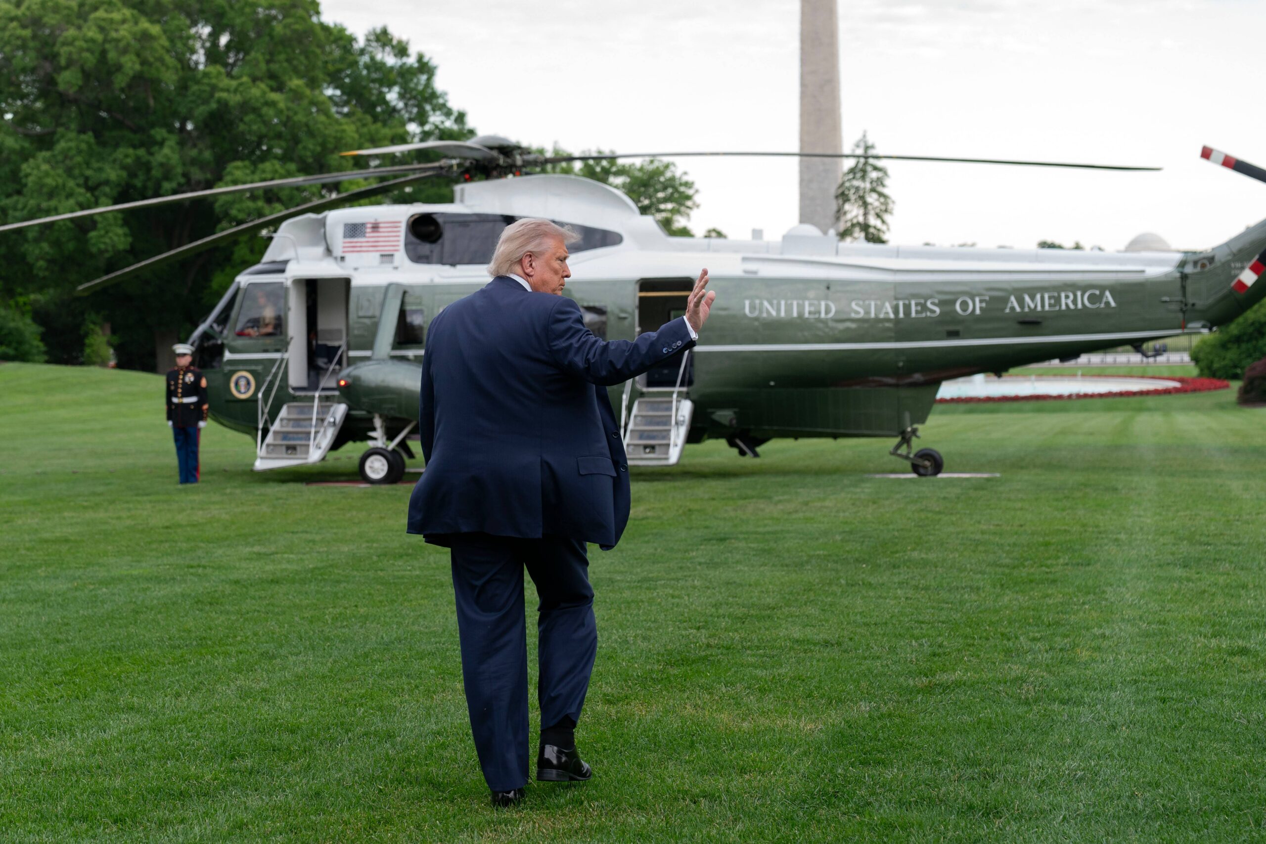President Donald Trump waves to reporters as he walks to board Marine One on the South Lawn of the White House, Friday, May 8, 2026, in Washington. Photo: Jose Luis Magana/AP