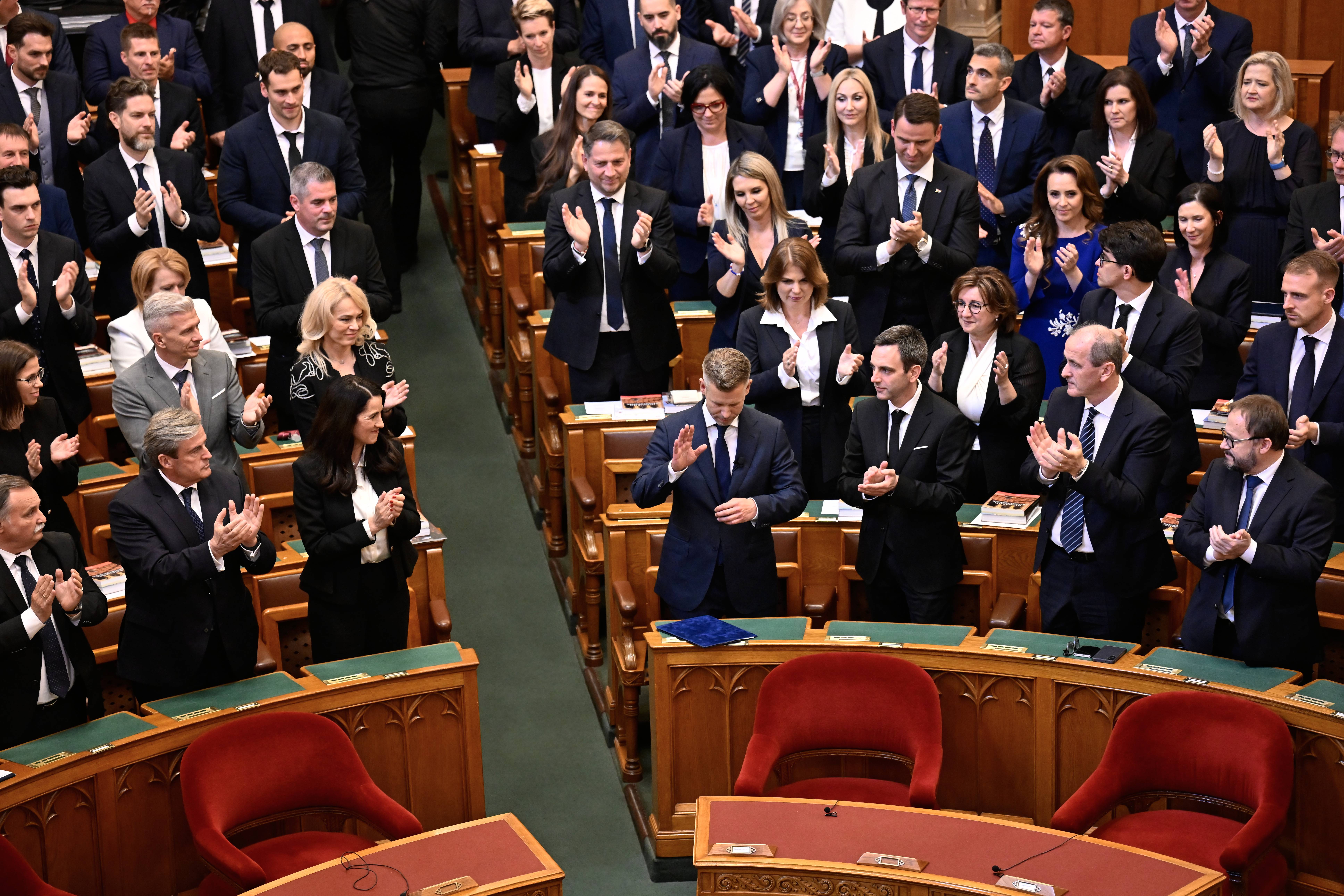 Hungary's new Prime Minister Peter Magyar, center, receives ovation after the inaugural session in Budapest, Hungary, Saturday, May 9, 2026. Photo: Denes Erdos/AP