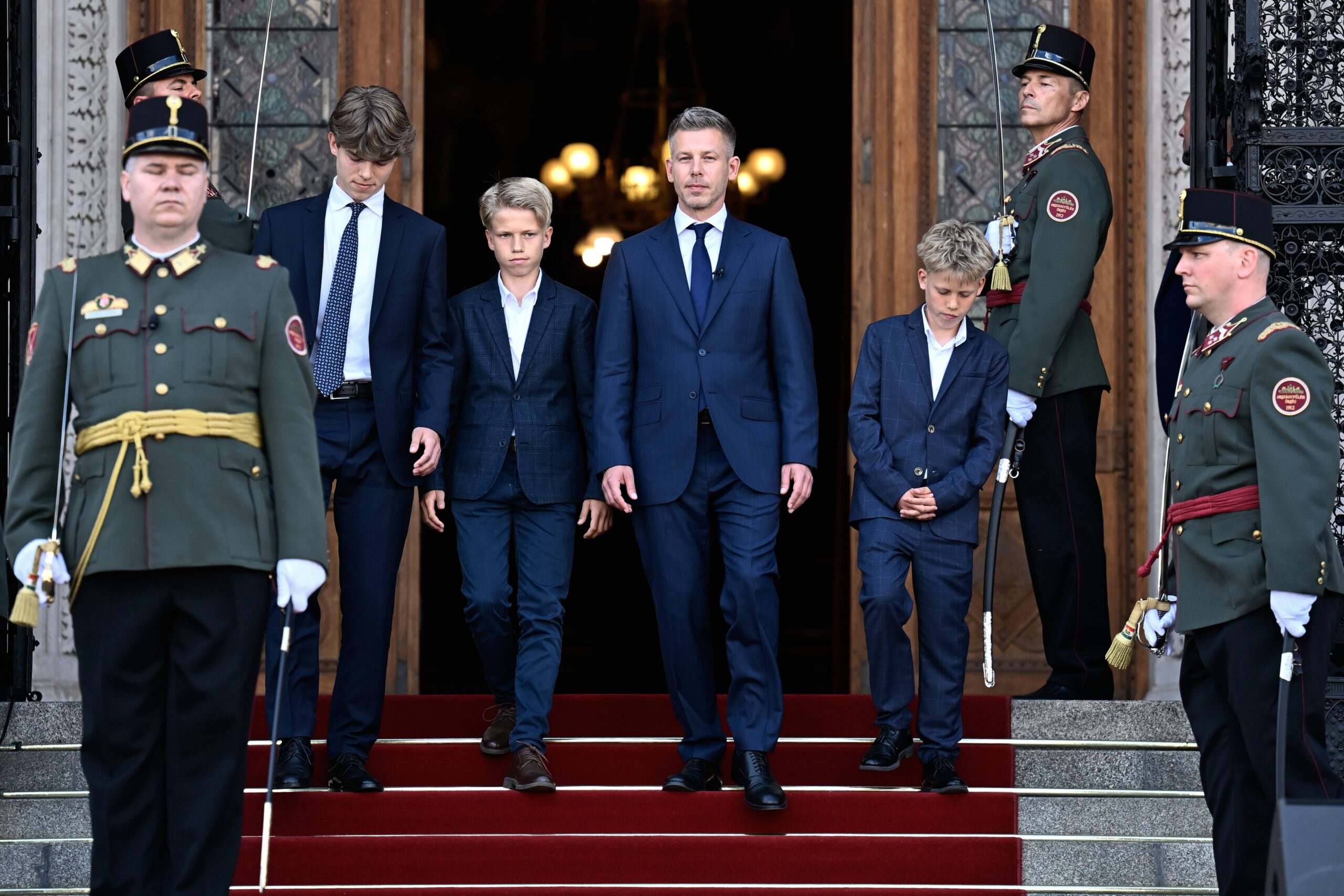 Hungary's new Prime Minister Peter Magyar leaves the Hungarian Parliament with his sons after ceremony in Budapest, Hungary, Saturday, May 9, 2026. Photo: Denes Erdos/AP