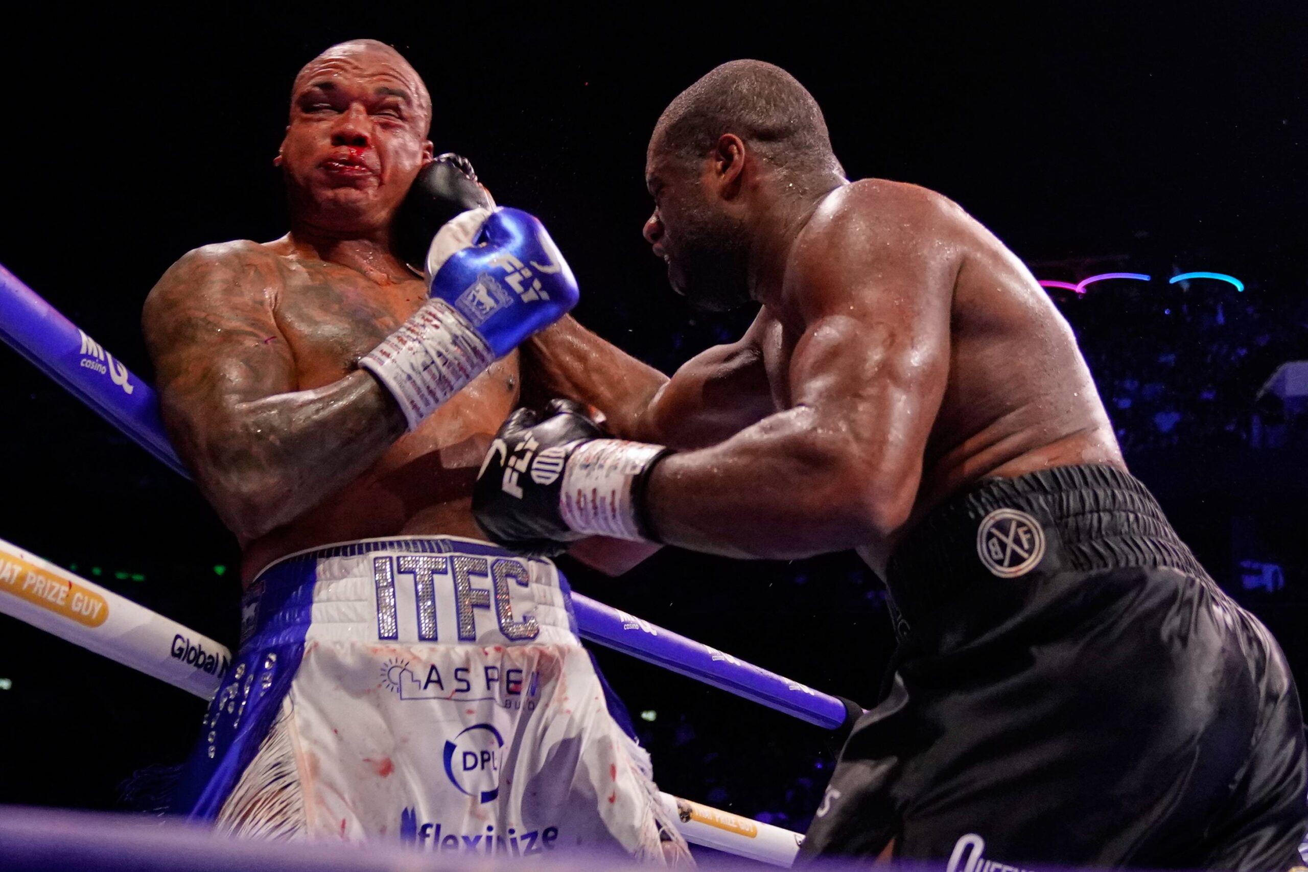 Britain's Daniel Dubois, right, lands a blow on Britain's Fabio Wardley during their WBO World Heavyweight boxing title bout in Manchester, Saturday, May 9, 2026. Photo: Dave Thompson/AP