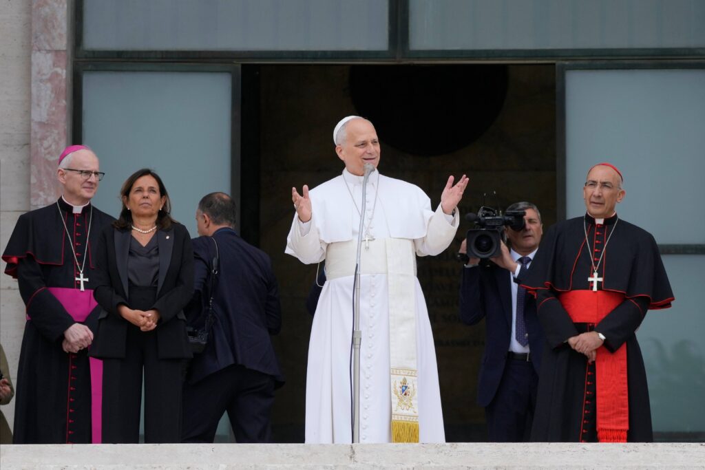 Pope Leo XIV, accompanied by, from left, Prefect of the Pontifical Household Archbishop Petar Rajič, Dean Antonella Polimeni, and his vicar for the city of Rome Cardinal Baldo Reina, visits the Città Universitaria (University City) at Sapienza University of Rome to meet with faculty and students at the institution's primary campus, one of the world's oldest and largest universities, Thursday, May 14, 2026. Photo: Gregorio Borgia/AP