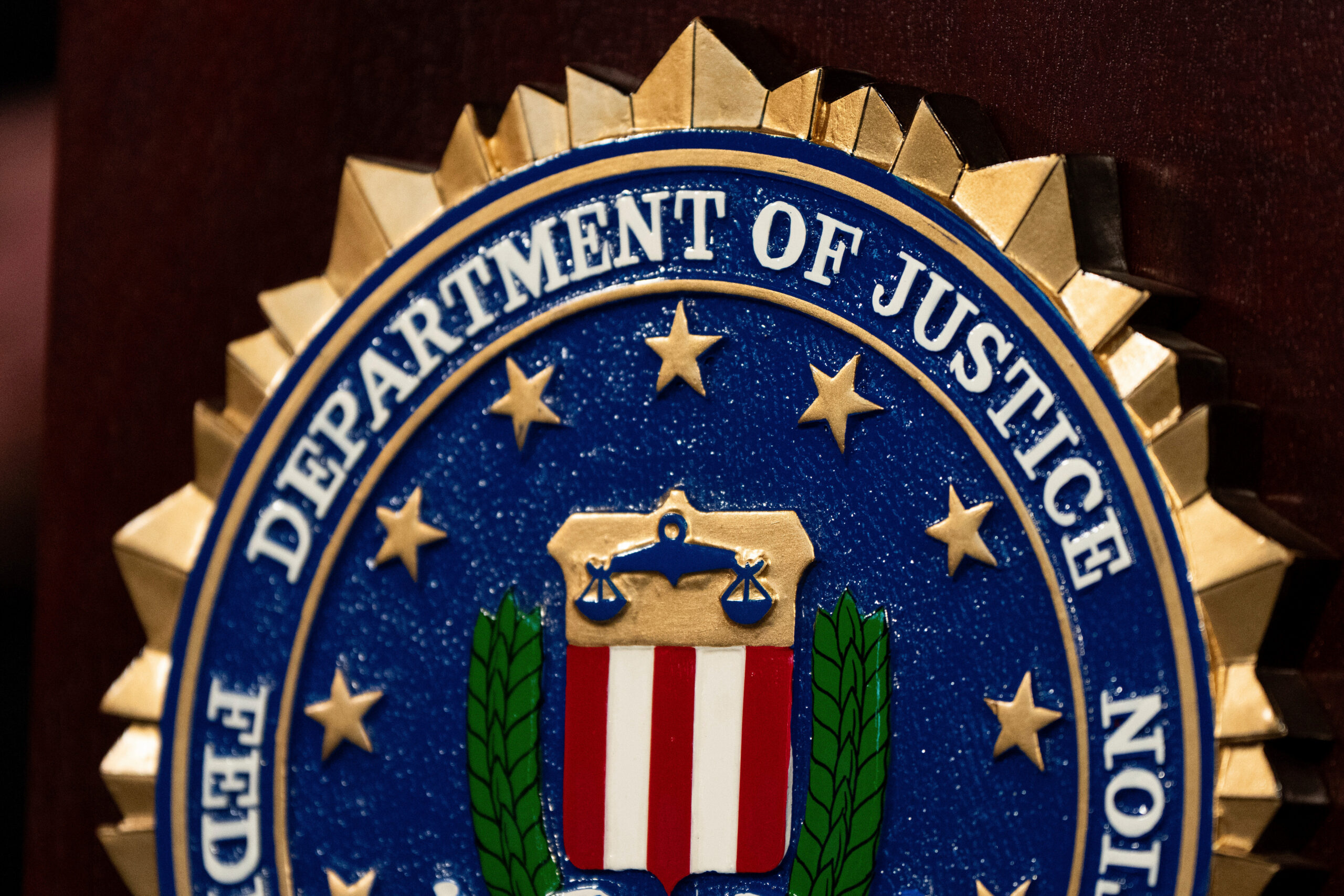 An FBI seal is displayed on a podium before a news conference at the field office in Portland, Ore., Thursday, Jan. 16, 2025. Photo: Jenny Kane/AP, File