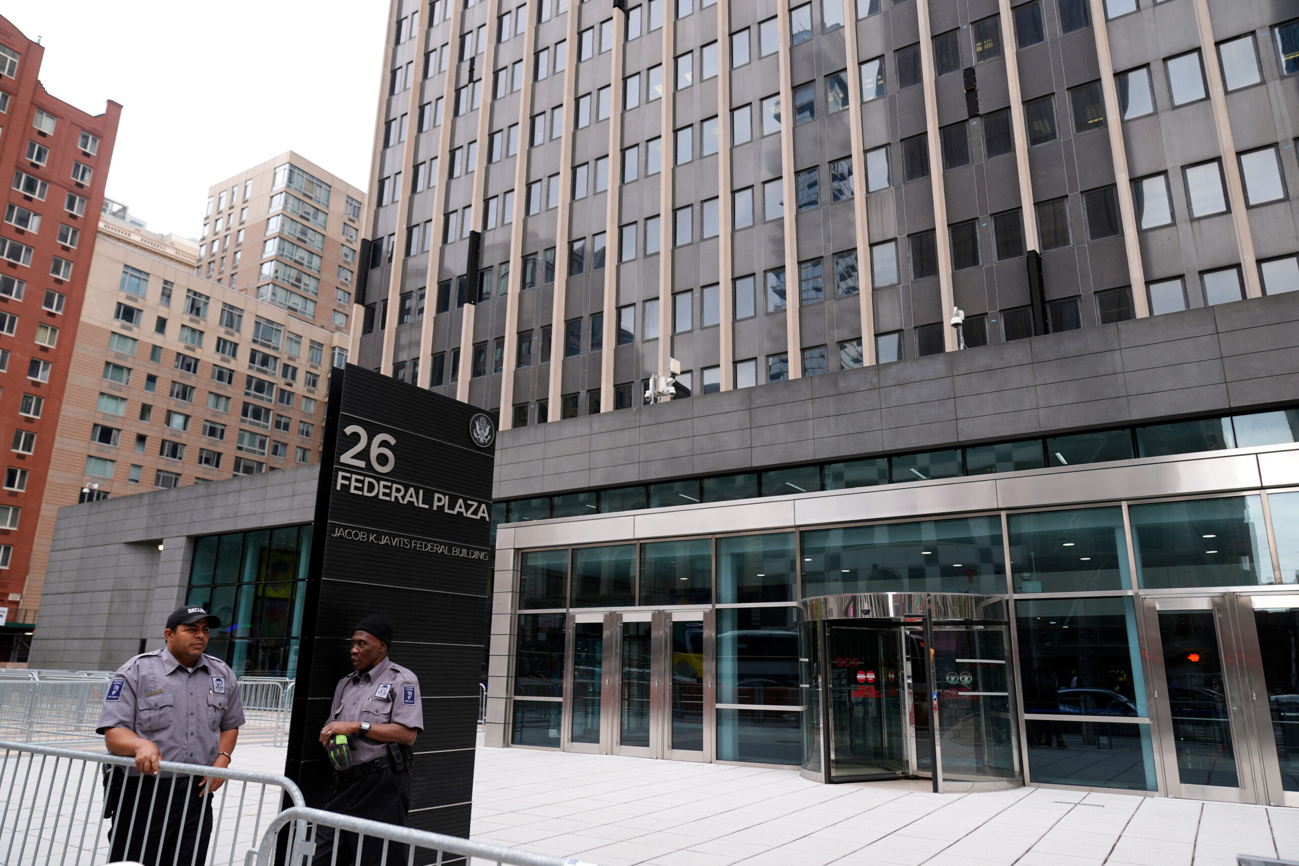 Security guards stand outside the Jacob K. Javits Federal Office Building at 26 Federal Plaza, Sept. 30, 2024, in New York. Photo: Pamela Smith/AP, File