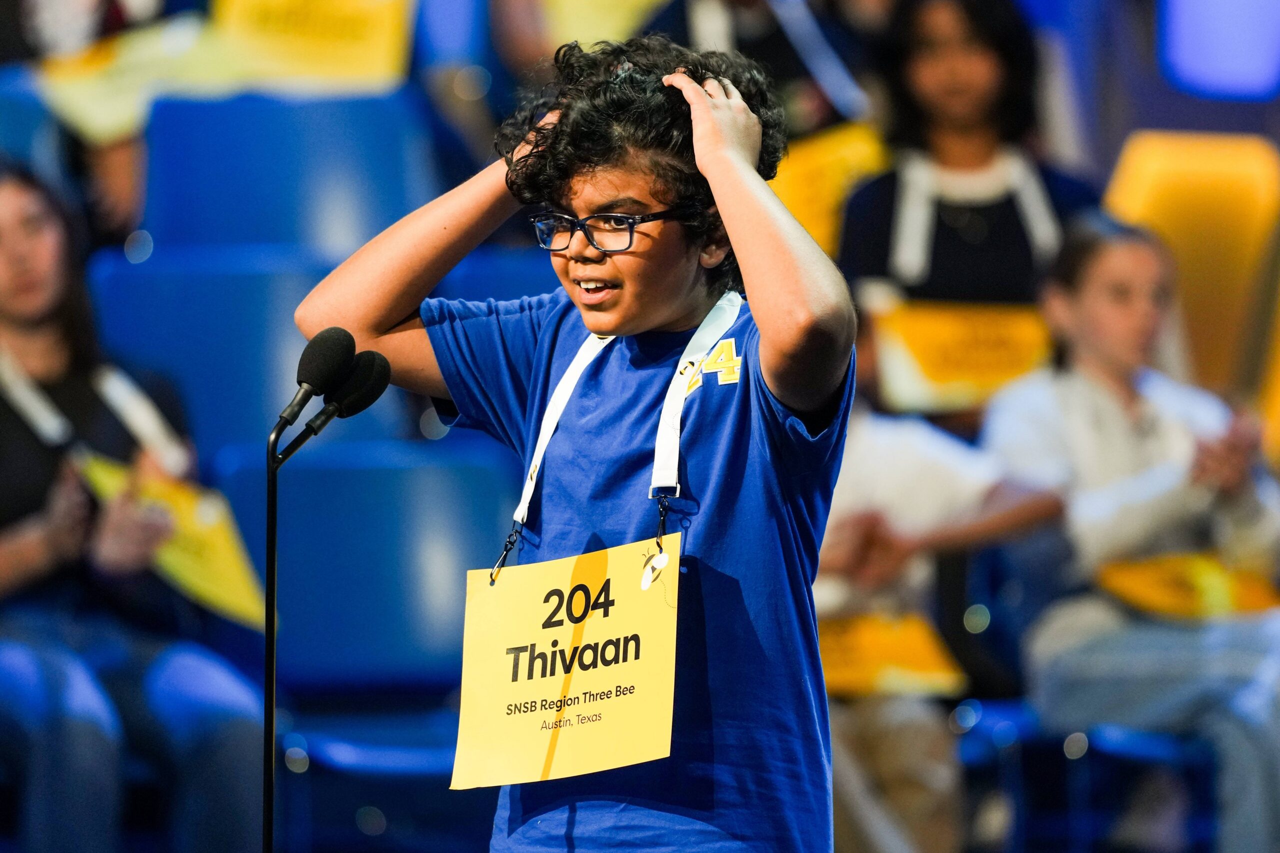 Thivaan Butani, 12, of Austin, Texas, reacts after giving a correct answer during the first preliminary round of the Scripps National Spelling Bee, Tuesday, May 26, 2026, in Washington. Photo: Allison Robbert/AP