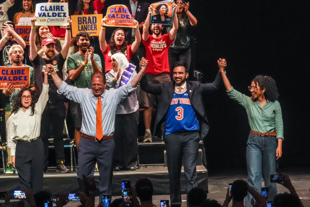 Democratic Congressional candidates Claire Valdez, left, Brad Lander, Mayor Zohran Mamdani and Darializa Avila Chevalier celebrate on stage during a Get Out The Vote rally ahead of New York's primary election, June 18, 2026. Credit: AP Photo/Ryan Murphy