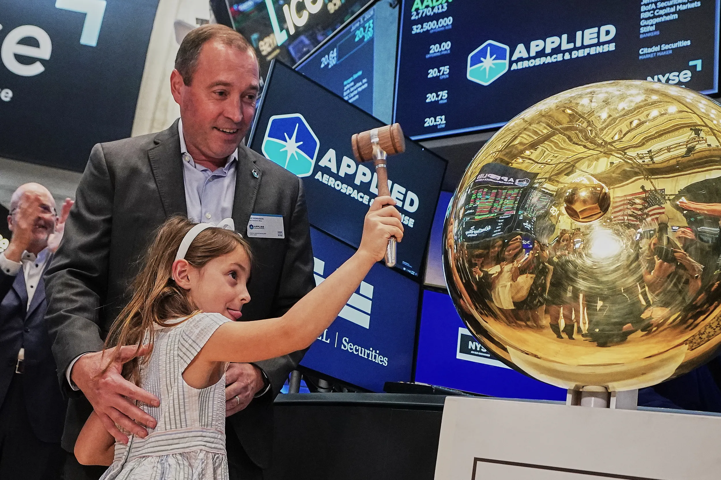 MANHATTAN — A company and a mission scaled for the future: Applied Aerospace & Defense CEO Trip Ferguson watches as his daughter Sofia, age 5, rings a ceremonial bell when his company begins trading on the floor of the New York Stock Exchange, Wednesday, June 3, 2026. Photo: Richard Drew/AP