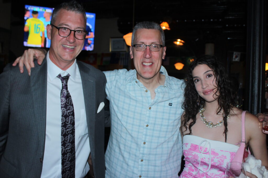From left: Darran Winslow, Esq., Michael Farkas, Esq., and Isabella Farkas. Photo: Mario Belluomo/Brooklyn Eagle