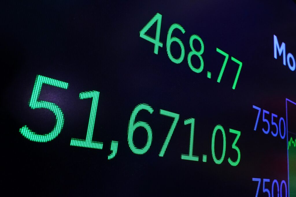 A board above the New York Stock Exchange trading floor displays the closing number for the Dow Jones industrial averge, Monday, June 15, 2026. Photo: Richard Drew/AP